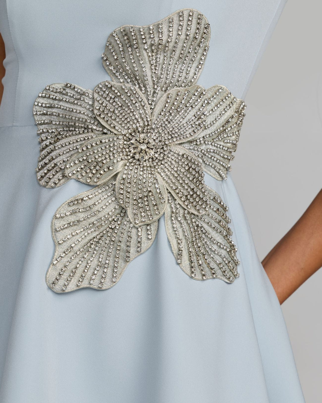 Blue Crepe Sleeveless Mini Dress With Rhinestone Flower - FOSTANI.com