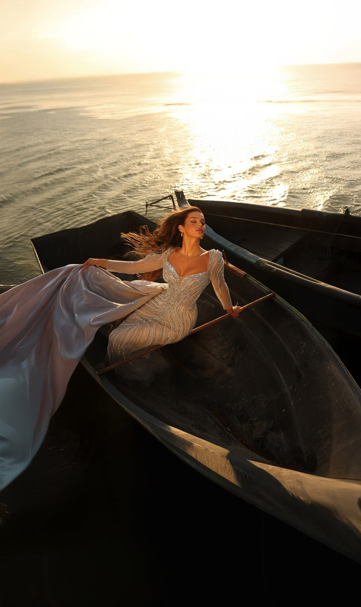 Delilah LD11475 Plunging Illusion Long Sleeve Beaded Corset Sheath Gown with Overskirt - Grey front view