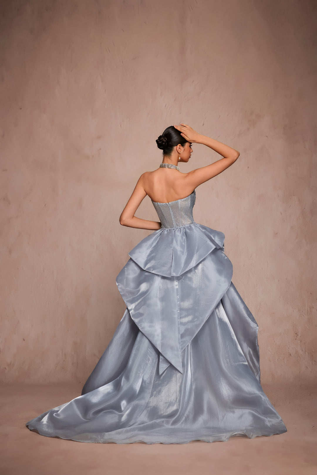 Delilah LD12102 Strapless Crystal Corset Mermaid Gown with Draped Satin Overskirt - Grey back view