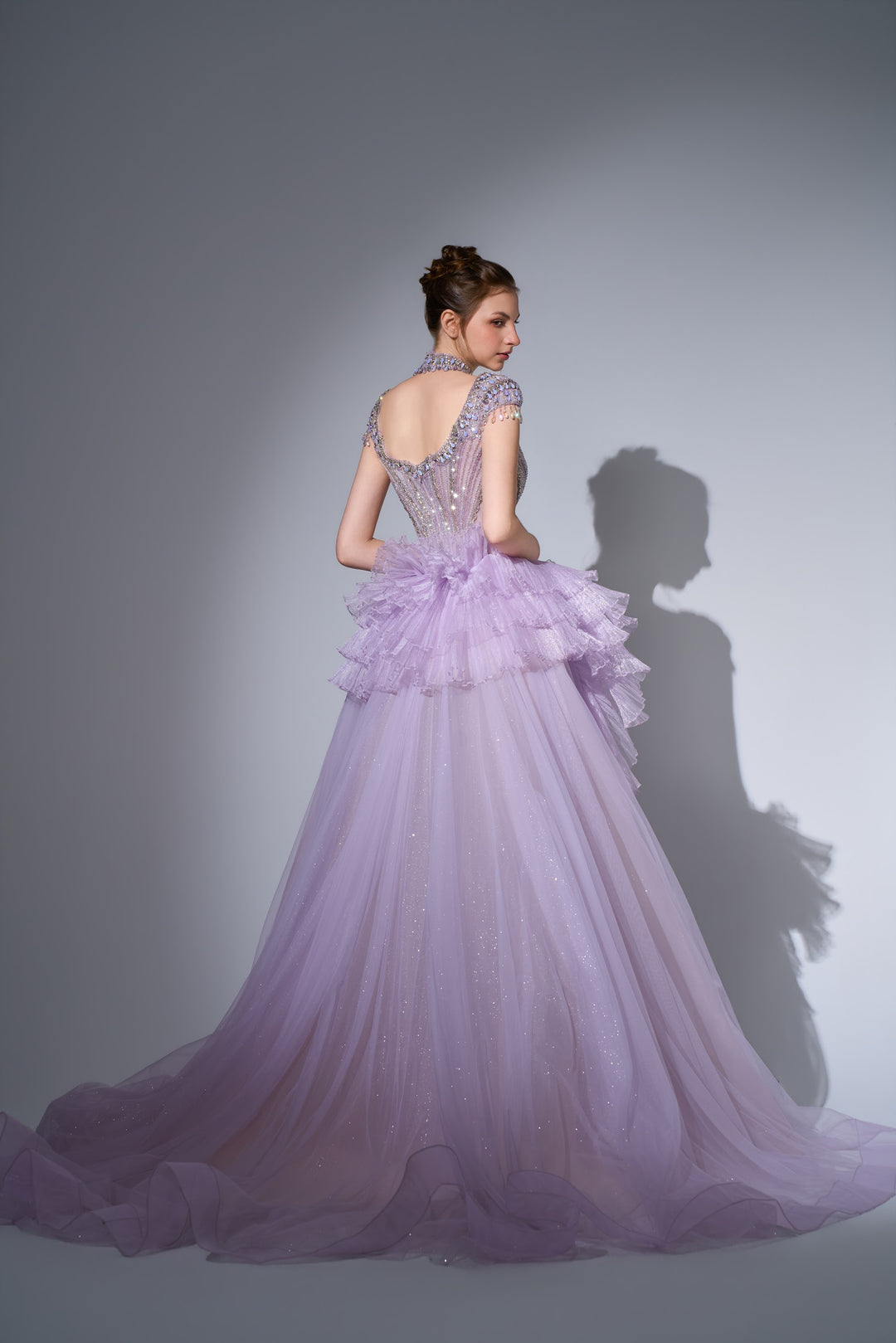 Delilah SH12057 High Neck Cap Sleeve Crystal Mermaid Gown with Ruffled Overskirt - Lilac back view