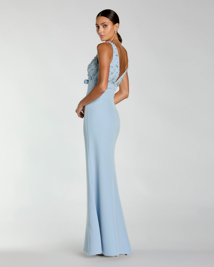Blue Crepe Sleeveless Beaded V Neck Gown With Bow - FOSTANI.com