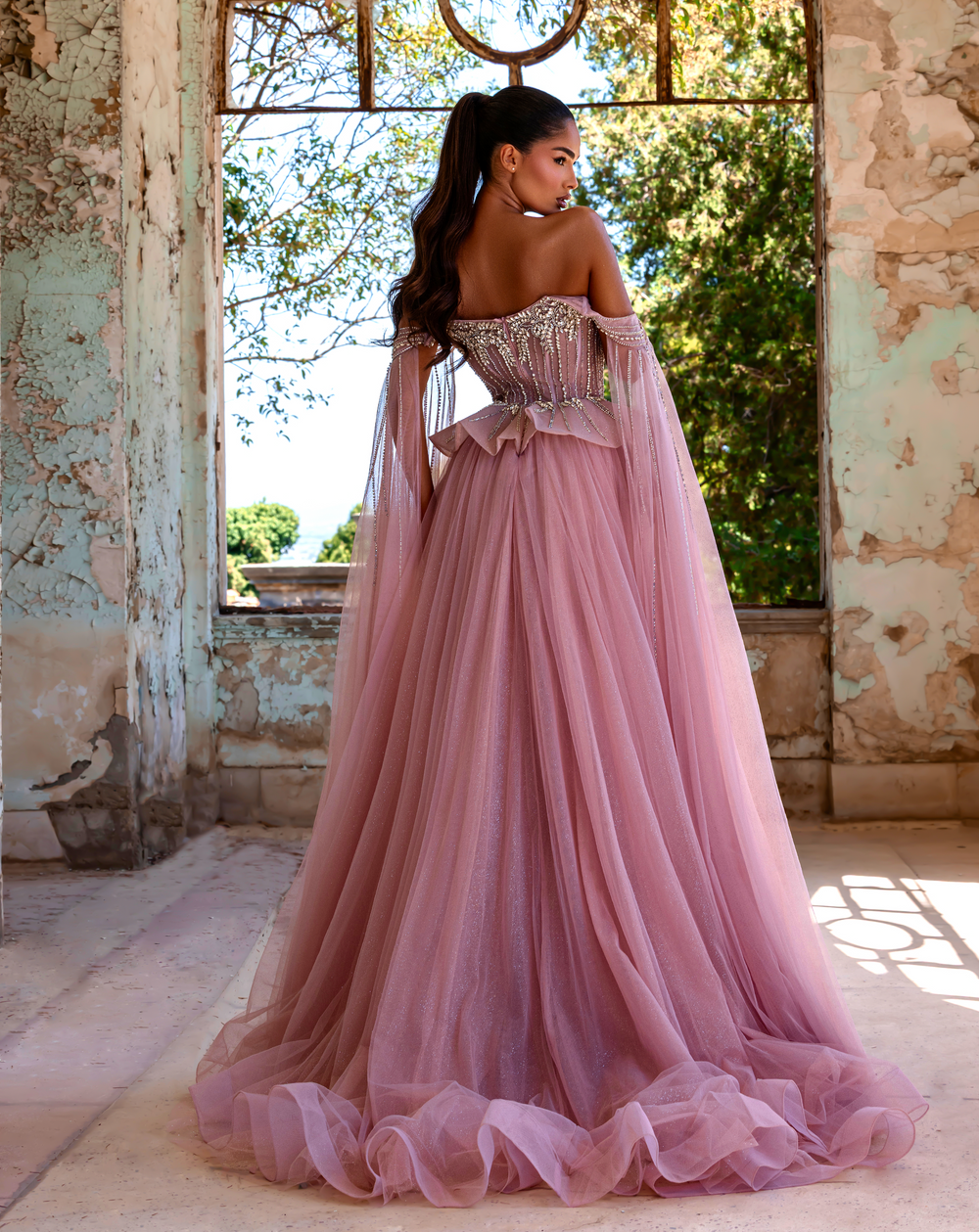 Delilah LD11214 Plunging Sweetheart Beaded Corset Mermaid Gown with Cape Sleeves and Overskirt - Pink back view