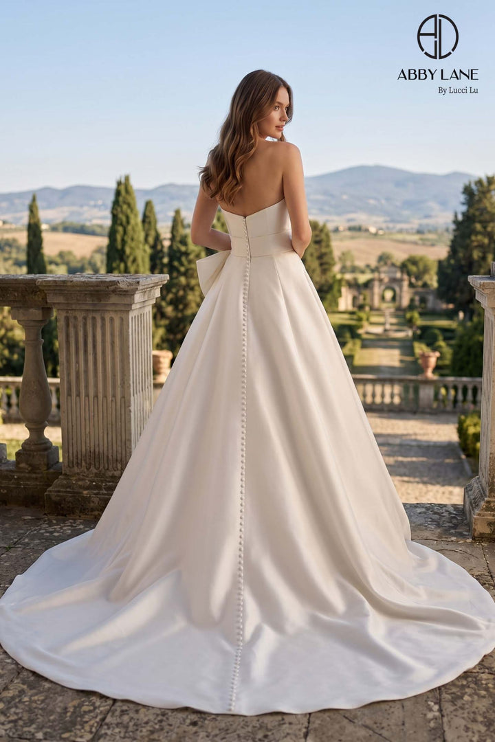 Abby Lane 97379 Open Back Bow Dress - FOSTANI.com