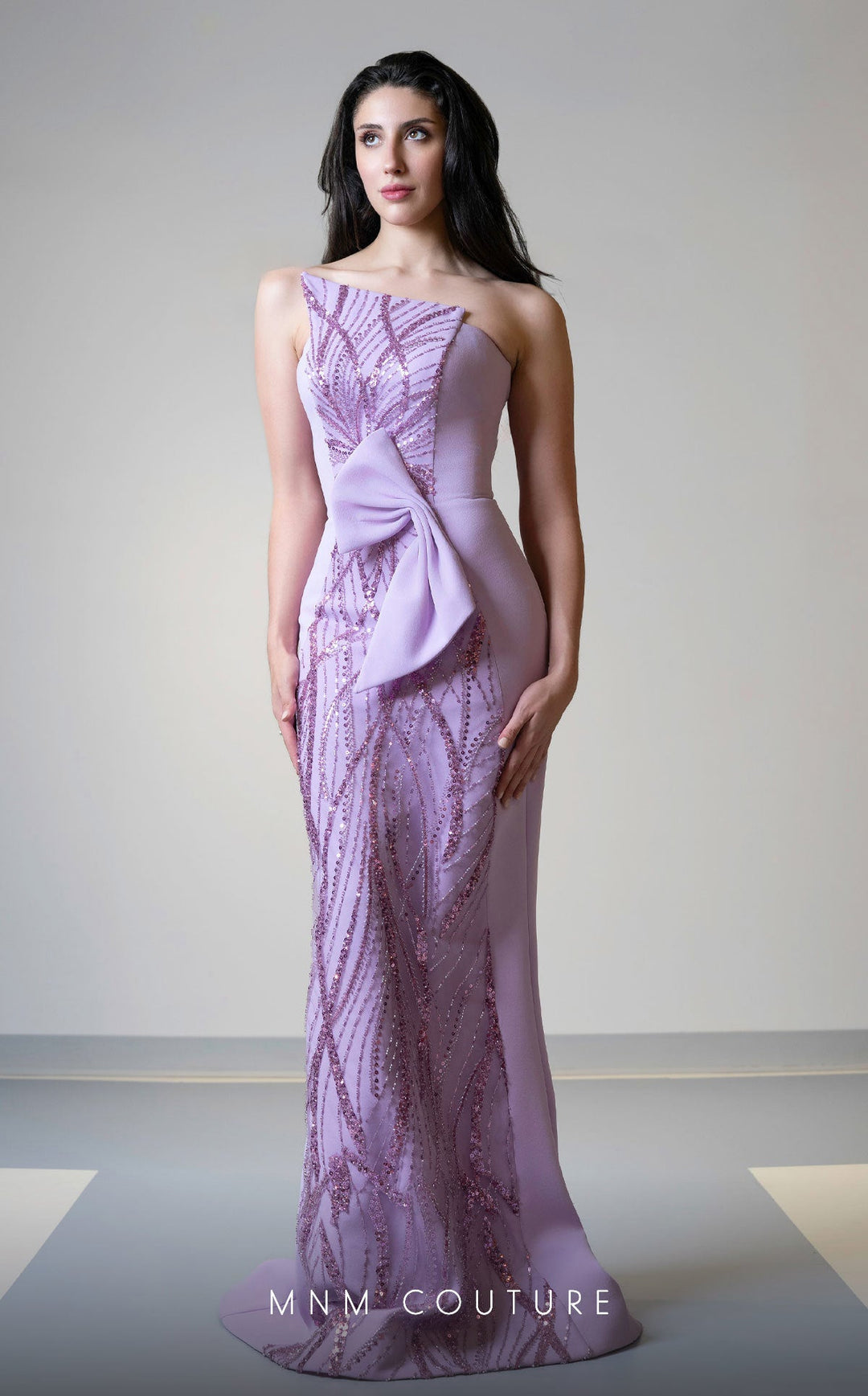 MNM Couture V07512 : Sleeveless Embroidered Center Column Gown with Waist Bow - FOSTANI.com
