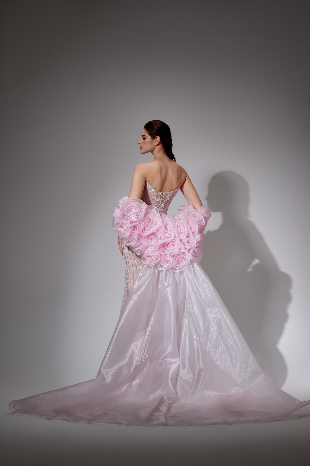 Delilah SH12052 Plunging Beaded Corset Mermaid Gown with Rosette Arm Puffs and Overskirt - Pink back view
